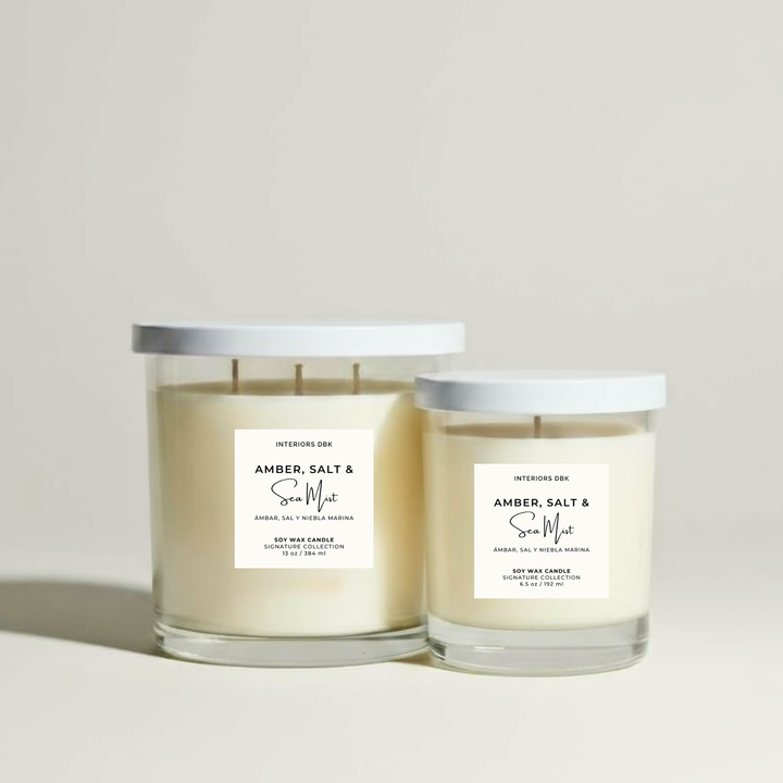 Amber, Salt & Sea Mist soy candle set by Interiors DBK featuring small and large clear glass vessels.