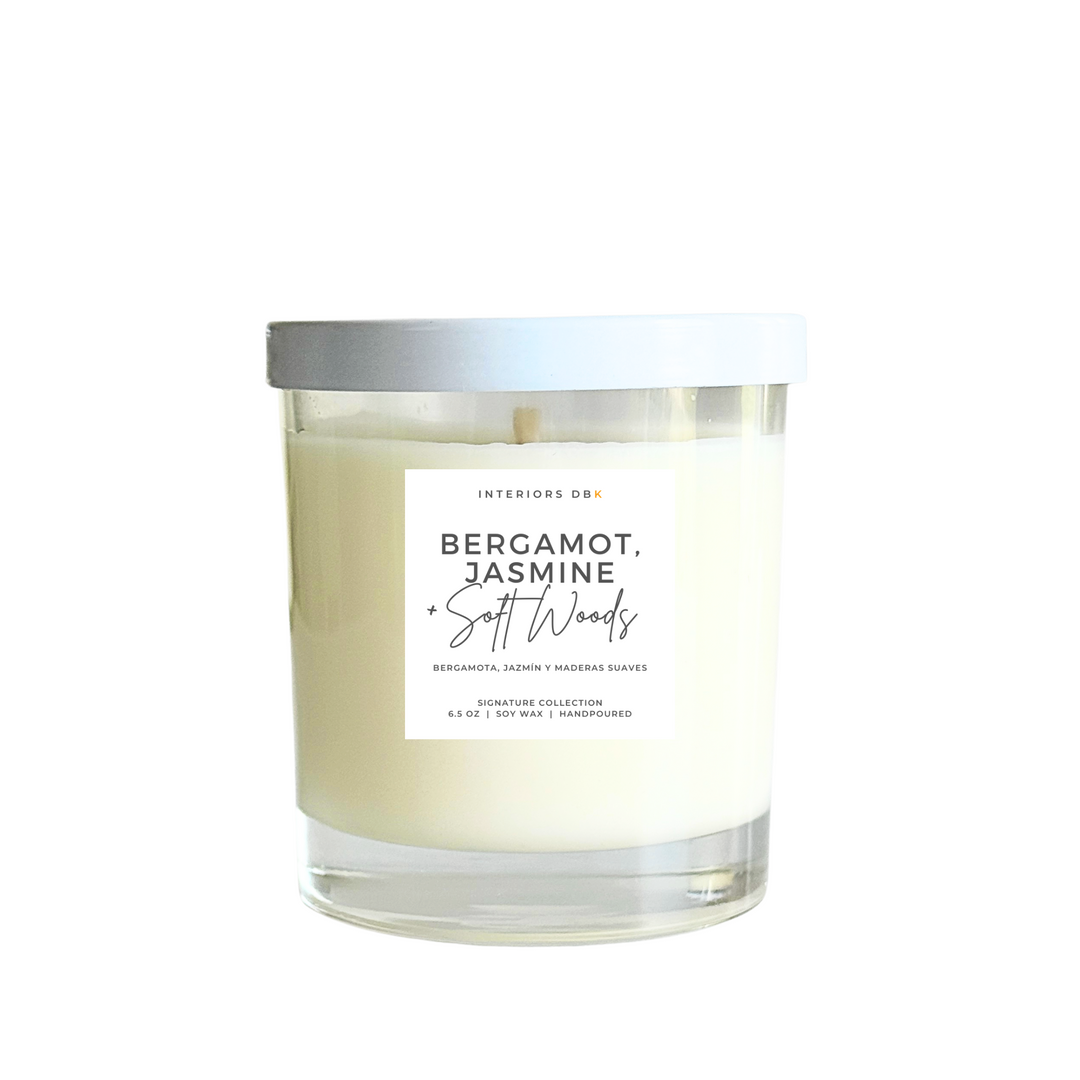 Luxury soy candle with citrus, jasmine, and soft wood notes from the Signature Collection, single wick