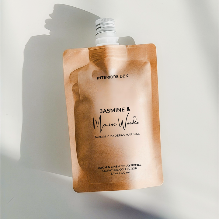 Jasmine &amp; Marine Woods room and linen spray refill by Interiors DBK in a reusable pouch, fresh marine and floral home fragrance.