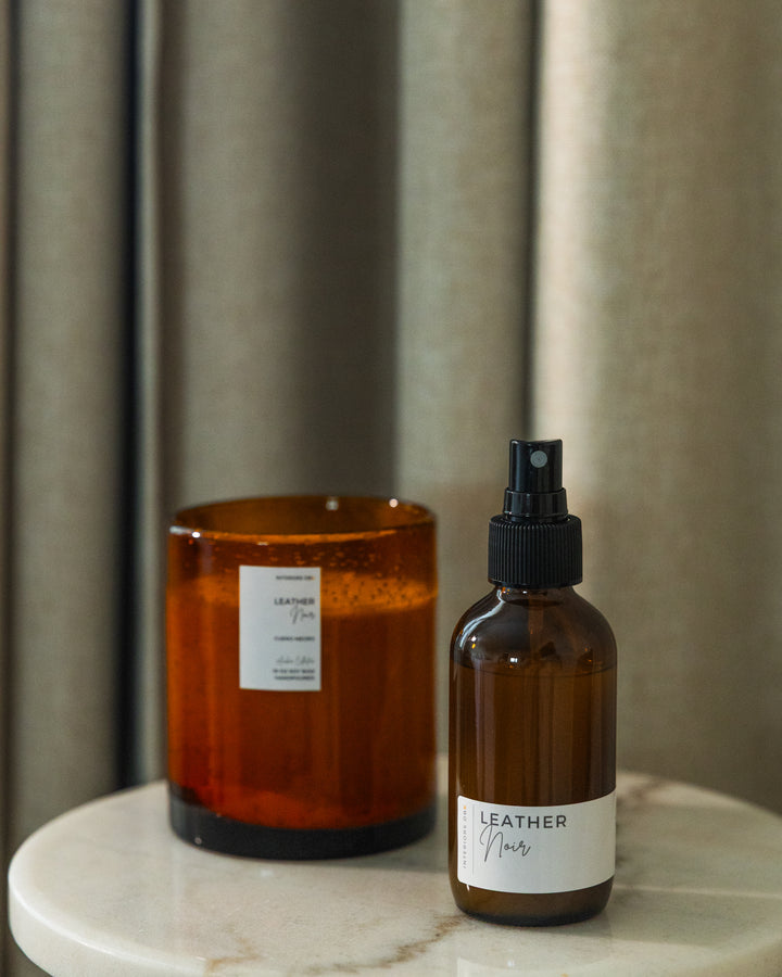 Leather Noir candle and room spray set.