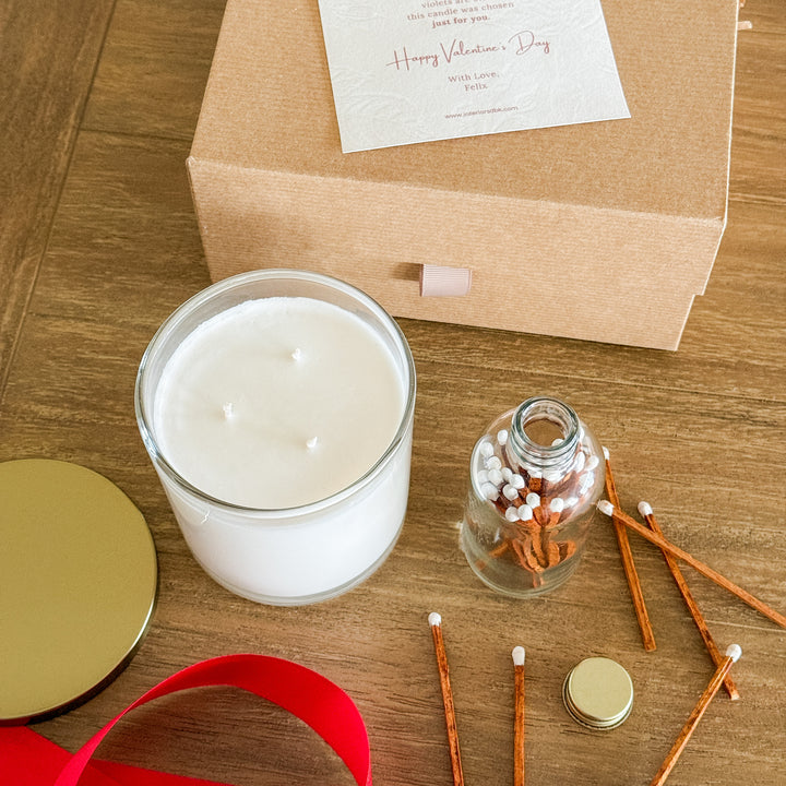 Romantic Valentine’s Day candle gift set in reusable glass vessel with safety matches and a love note.