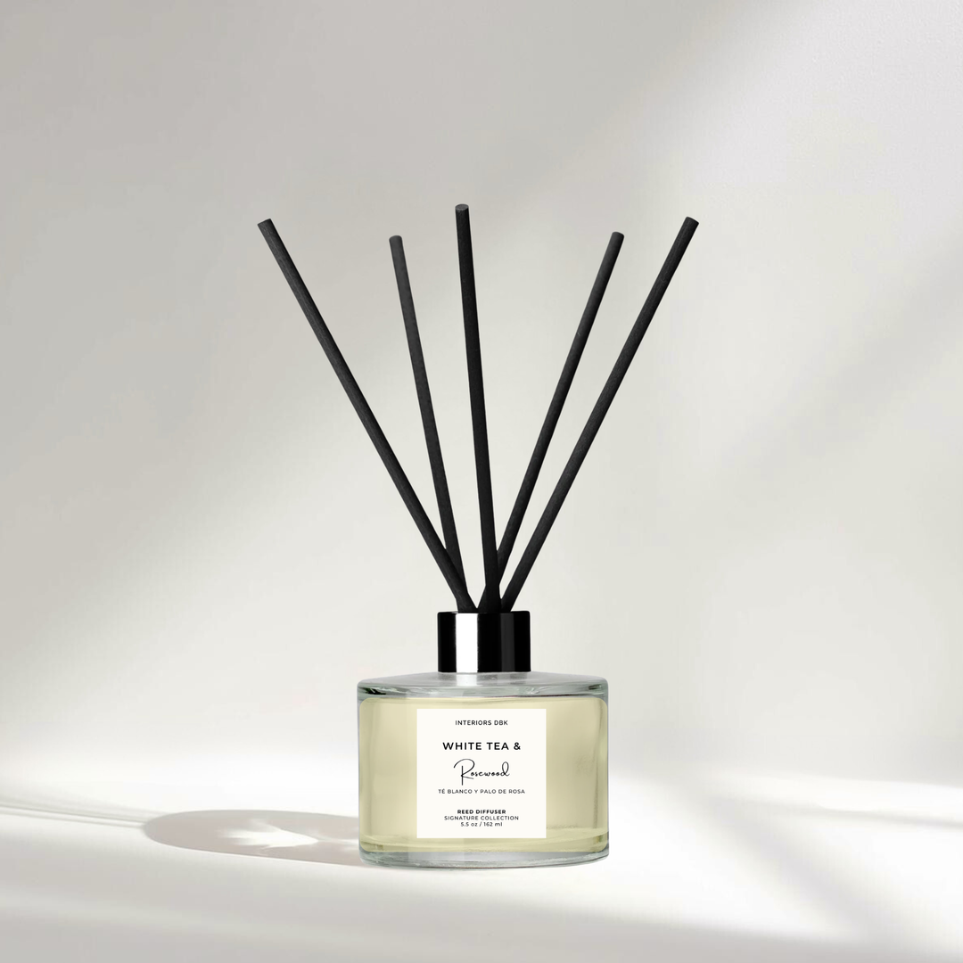 White Tea and Rosewood reed diffuser 5.5 oz with black fiber reeds, elegant floral non toxic flameless home fragrance by Interiors DBK.